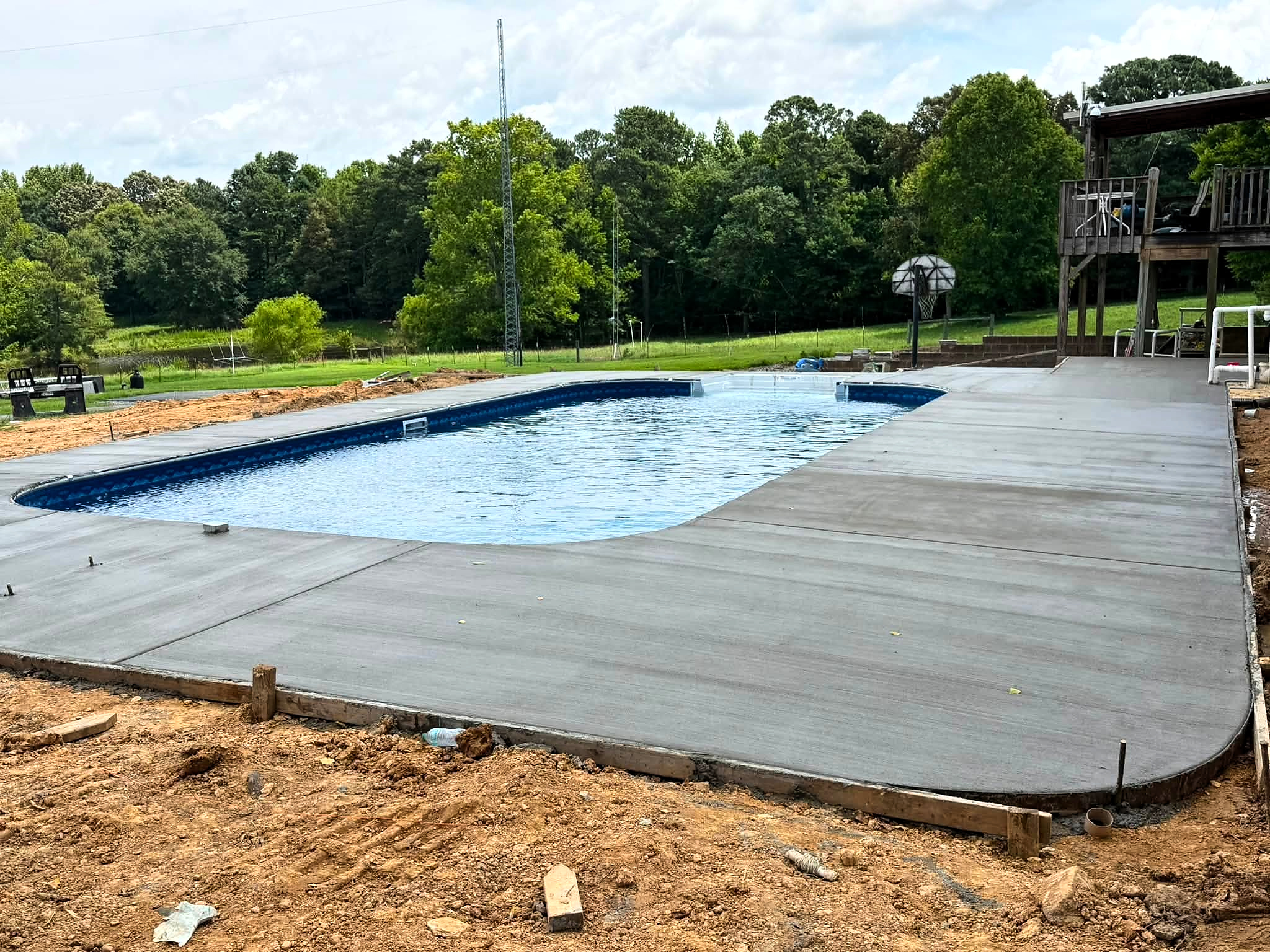 New concrete pool surround at a residential property